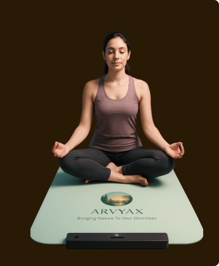 Woman meditating on Arvyax smart yoga mat